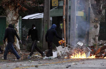 Delincuencia y protestas: El arrebato de Hinzpeter y el silencio de Espina